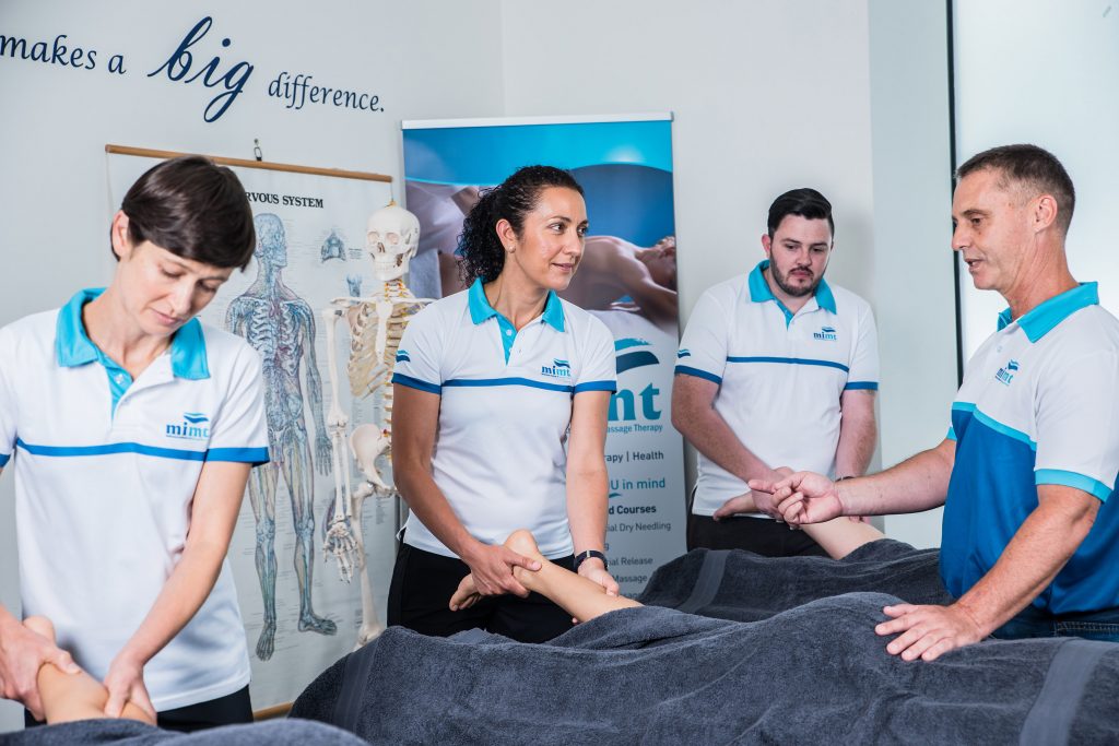 massage instructor teaching class